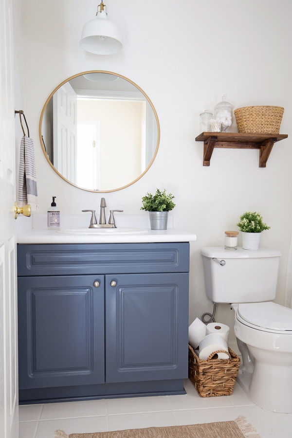 Bathroom Vanity with Gold Round Mirror in Navy Blue