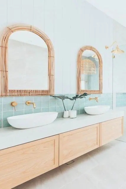 Bathroom Vanity with Mint Green Tile and Rattan Mirrors