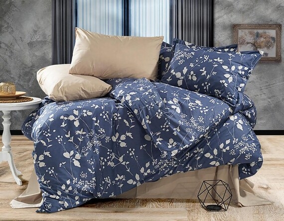 Bedding Set: Navy Botanical Print and Layered Neutrals Bedroom Idea