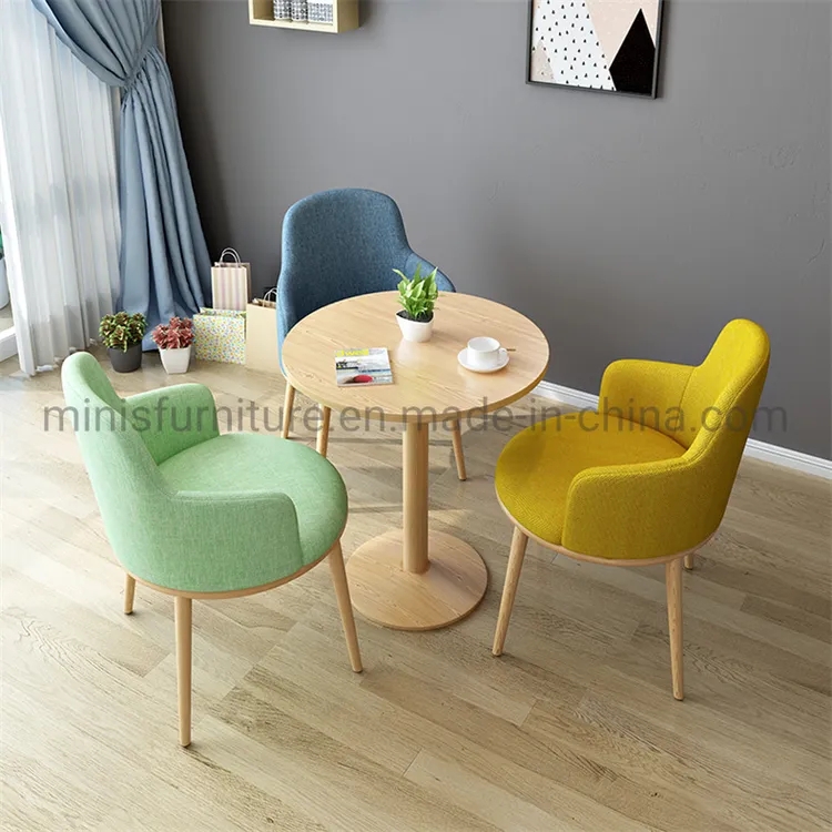 Bistro Set with Mismatched Upholstery and Colorful Negotiation Table