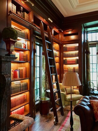 Bookcase Library with Sliding Ladder and Integrated Lighting