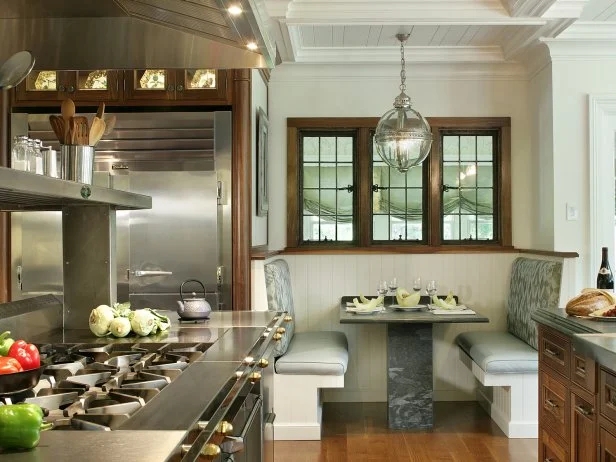 Built-In Booth Featuring White Paneled Base Storage