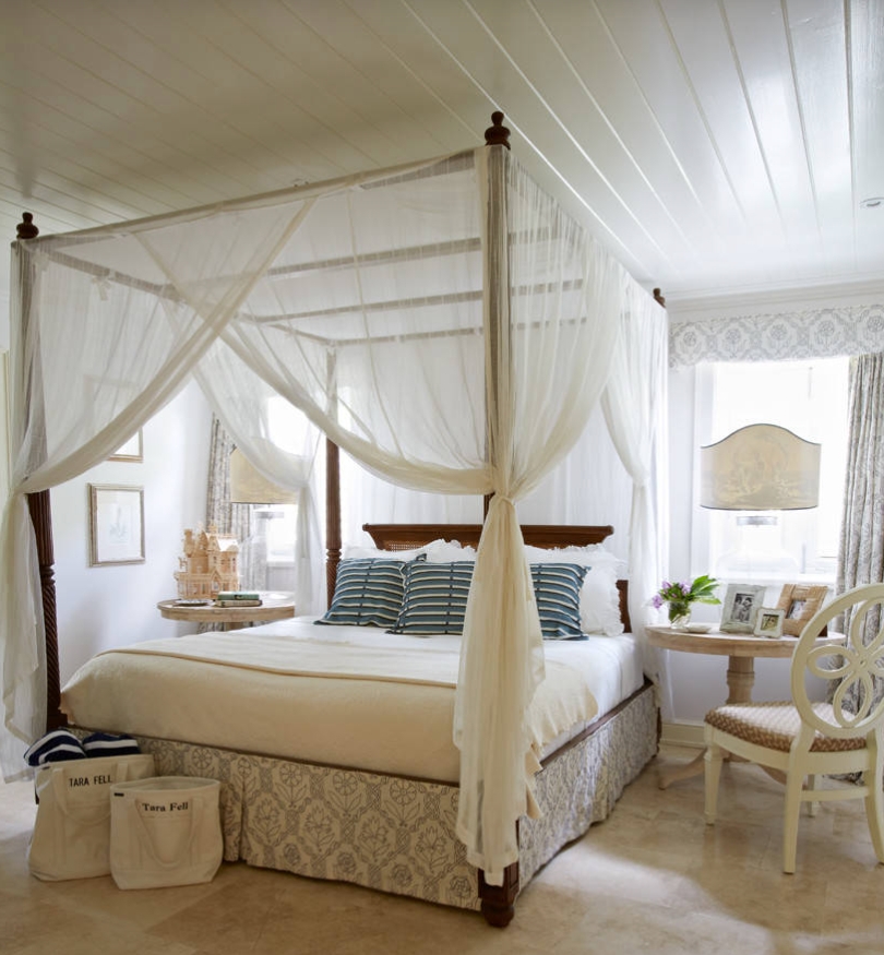 Canopy Bed showing Dark Wood Posts and Coastal Textile Ideas