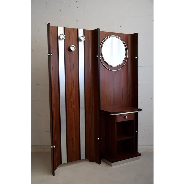 Coat Rack with Vertical Metal Strips and Integrated Mirror