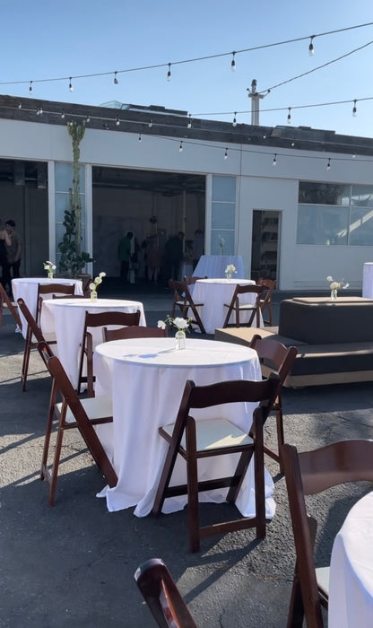 Cocktail Table with String Light Ambiance for Industrial Patio Event Design