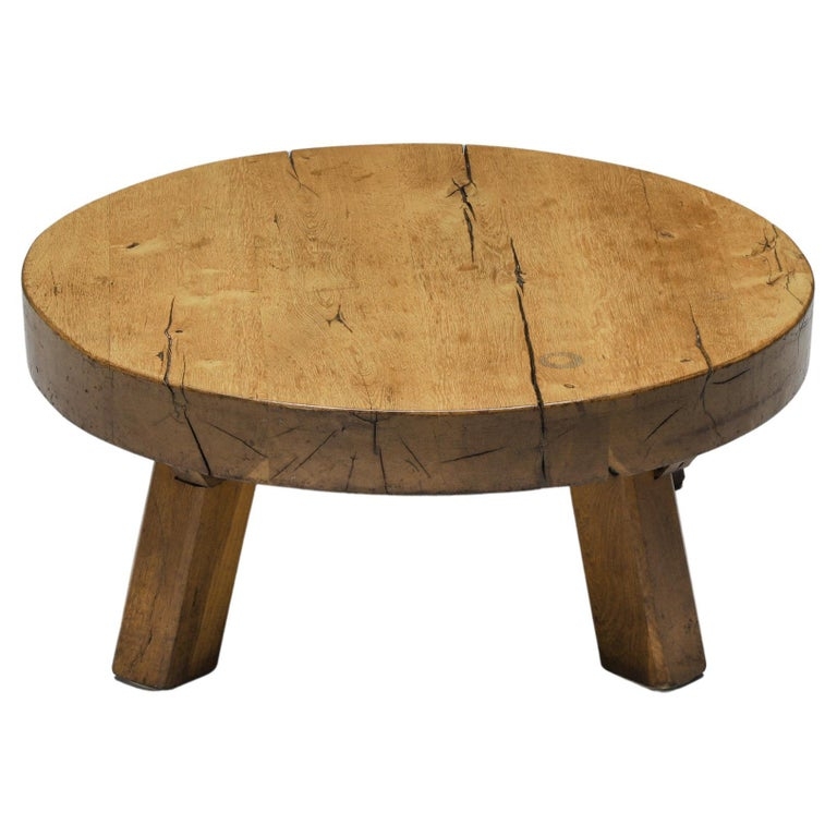 Coffee Table with Visible Cracks and Rustic French Base