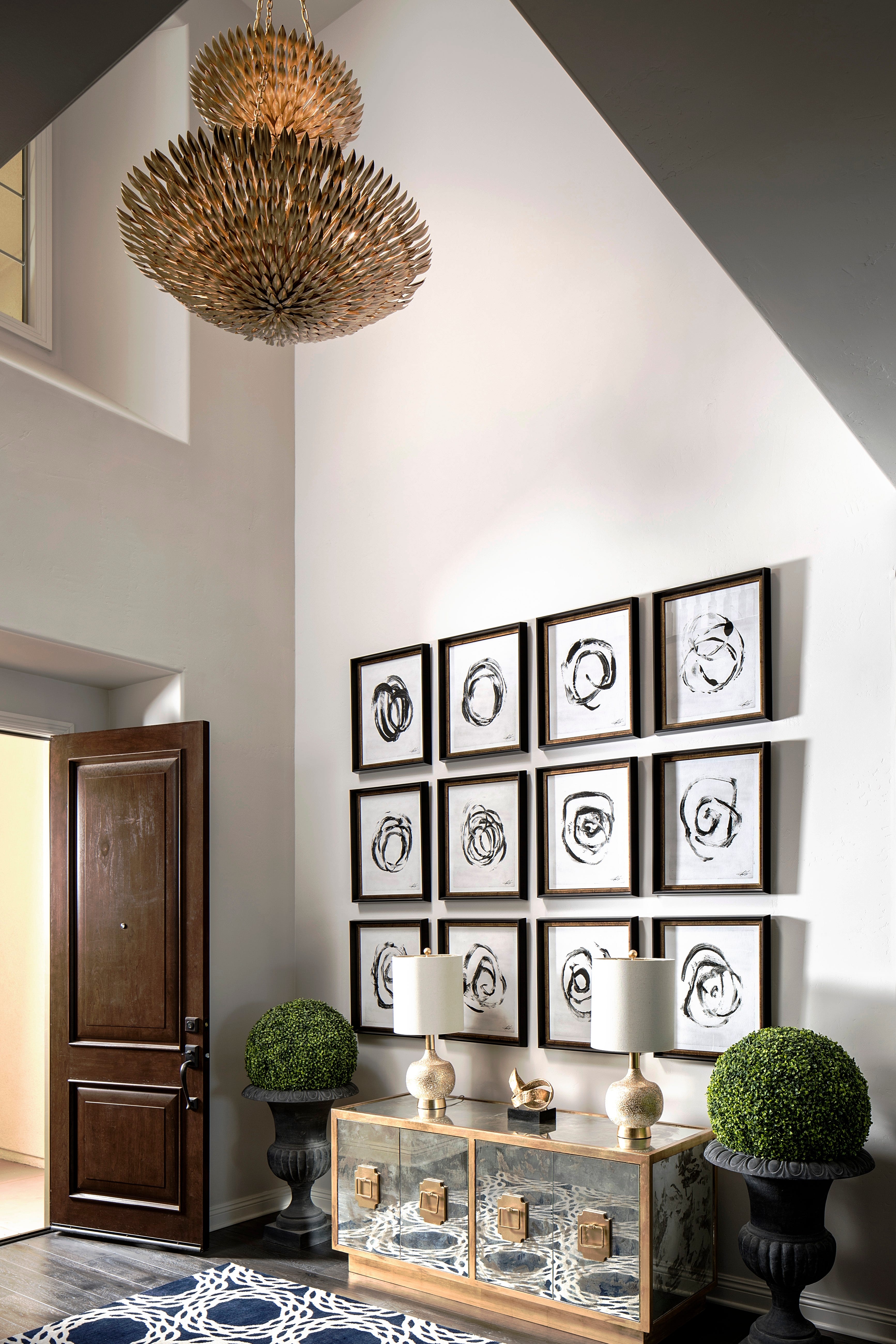 Console Table Mirrored Front and Twelve Piece Gallery Wall