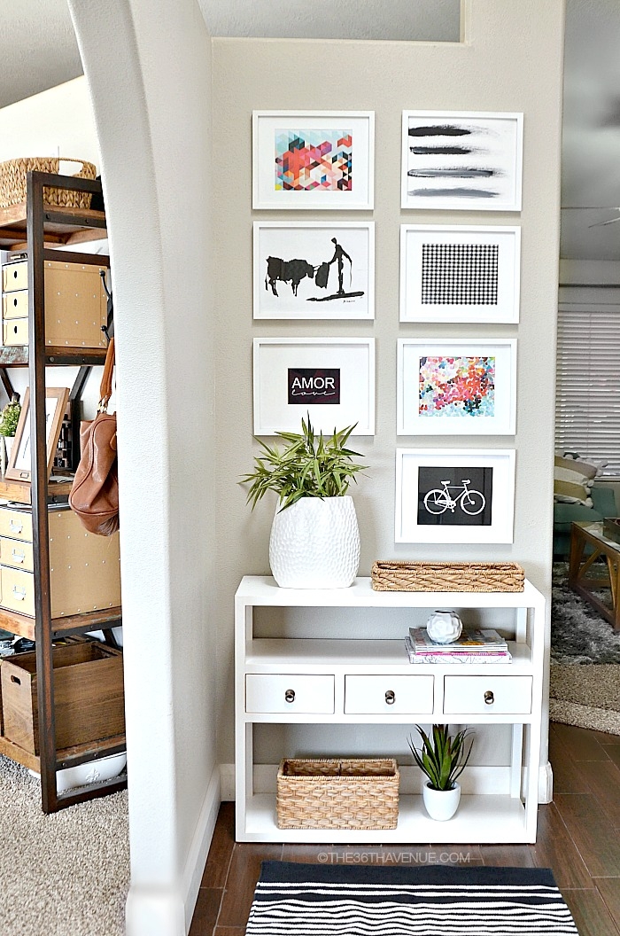 Console Table with Grid Gallery Wall and White Entryway Console