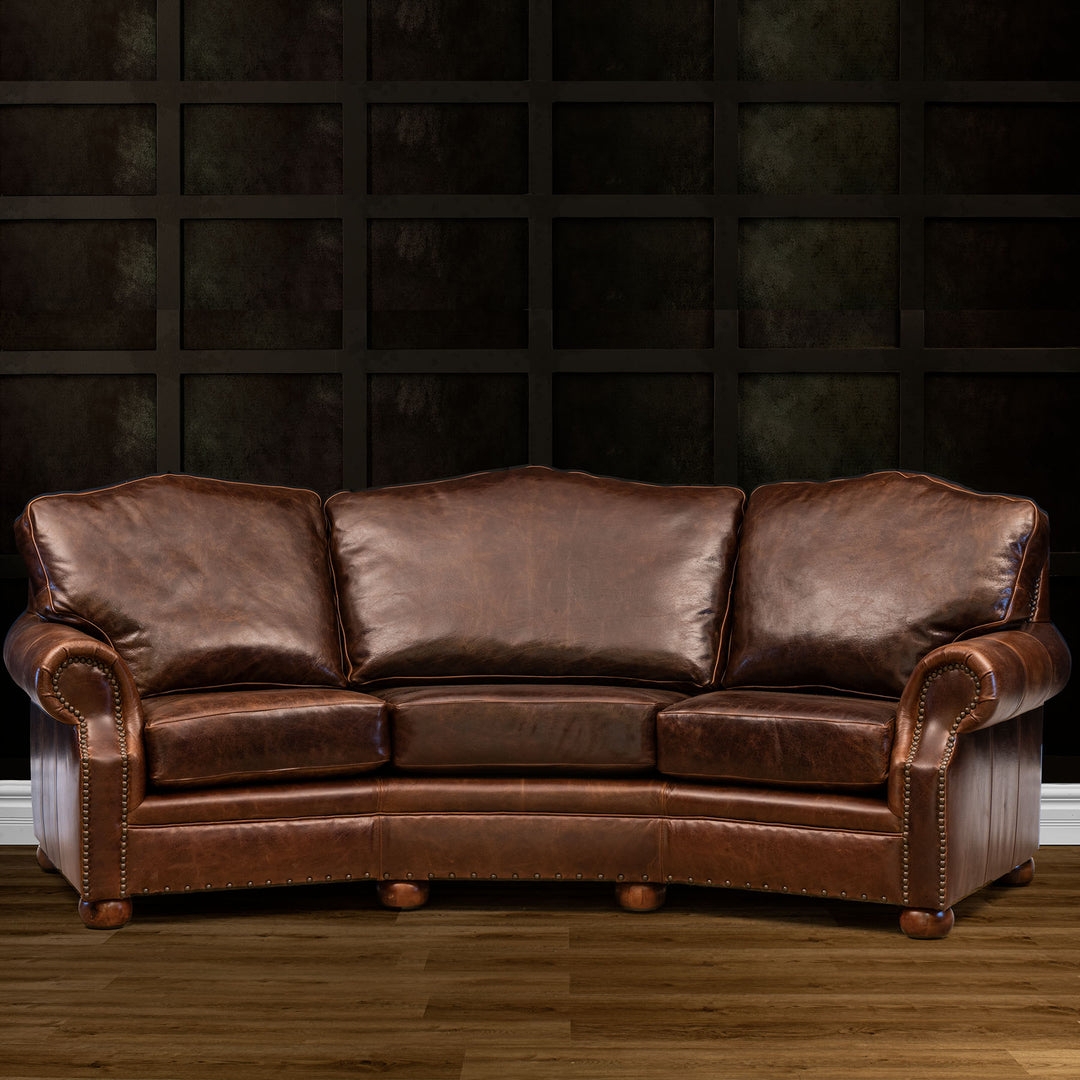 Conversation Sofa in Dark Rum Leather with Antique Bun Feet