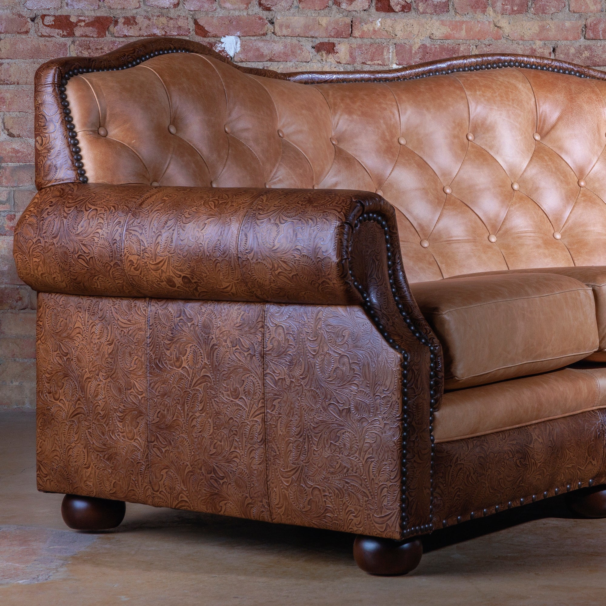 Conversational Sofa: Tooled Leather Sofa with Floral Detail