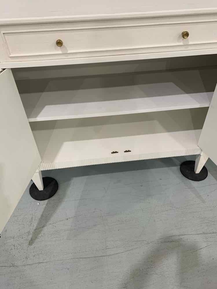 Credenza With Fluted Bottom Apron and Round Brass Knobs