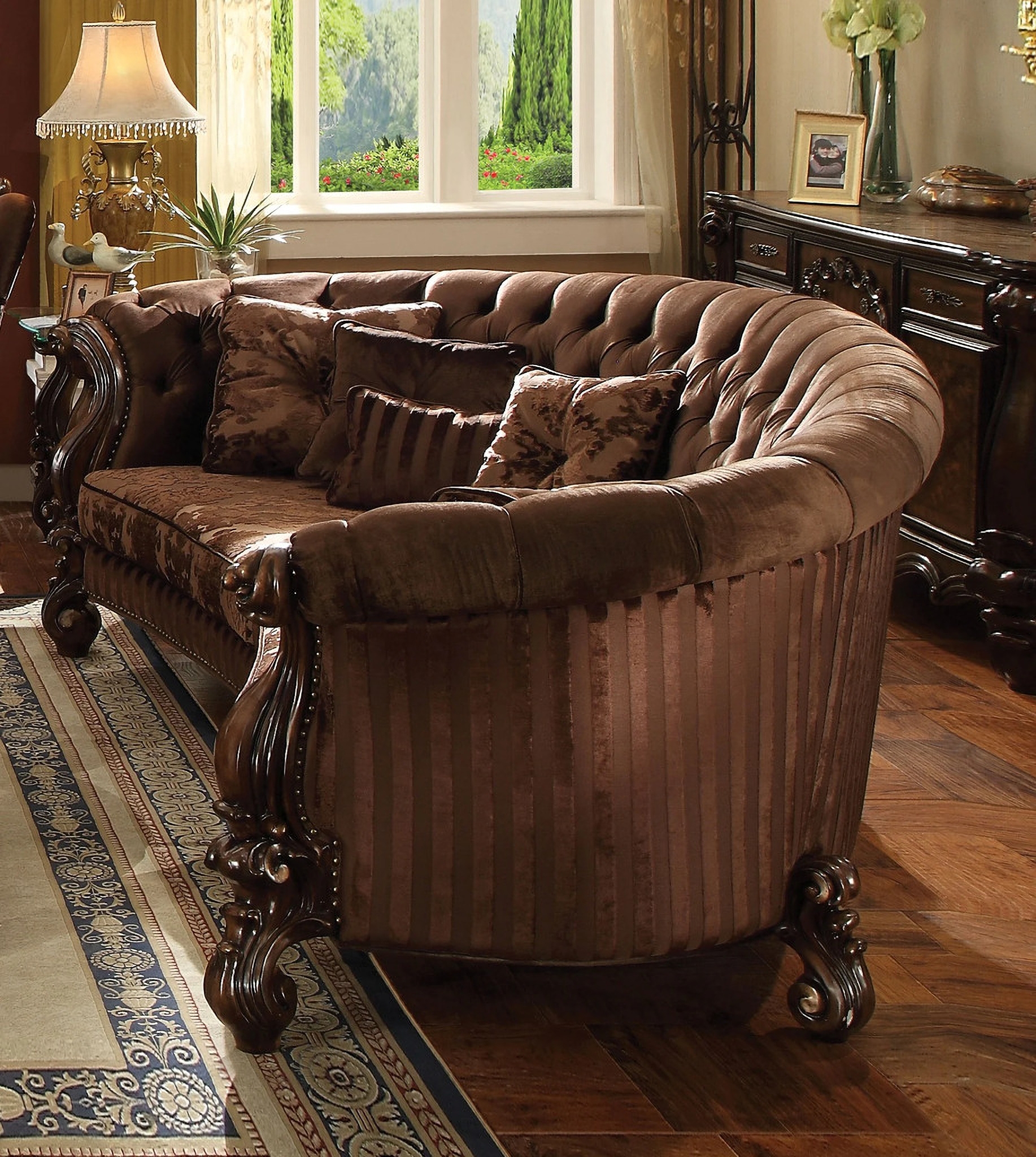 Crescent Sofa with Ornate Wood Carvings and Button Tufted Back