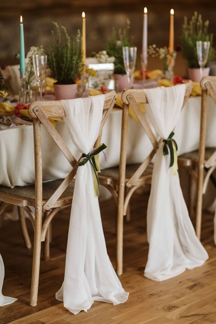 Cross Back Chair Vertical Fabric Drape and Ribbons