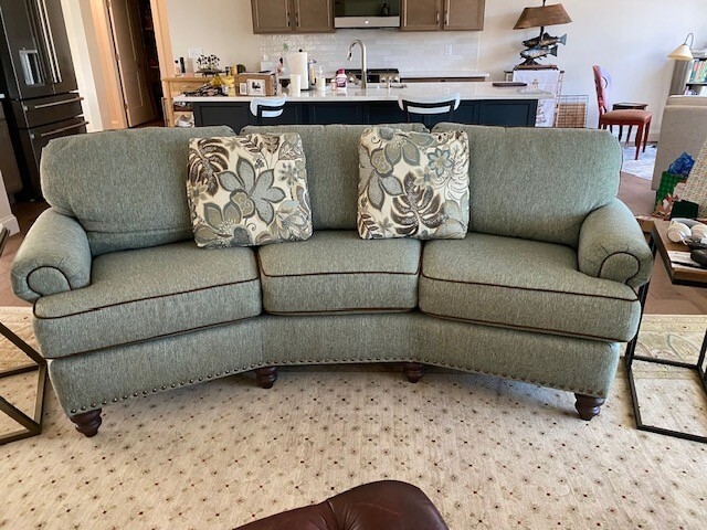 Curved Sofa: Sage Green Curved Sofa with Nailhead Trim Accents