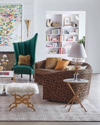 Curved Sofa with Leopard Pattern Upholstery and Gold Twisted Legs