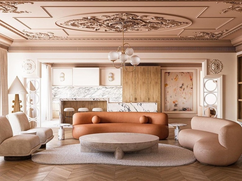 Curved Sofa with Rounded Bolster Pillows and Matte Finish