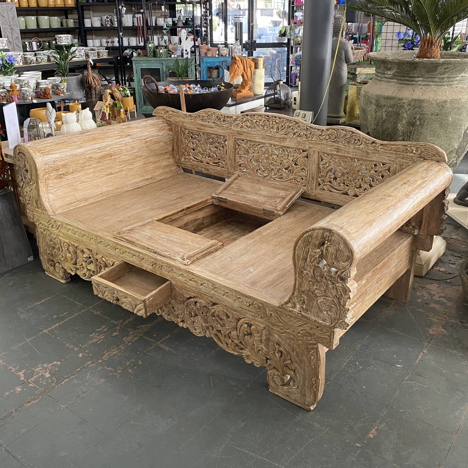 Daybed with Hidden Storage and Intricate Wood Carving