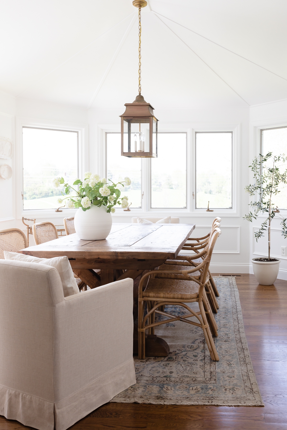 Dining Set: Rattan Armchairs, Lantern Pendant, Trestle Base