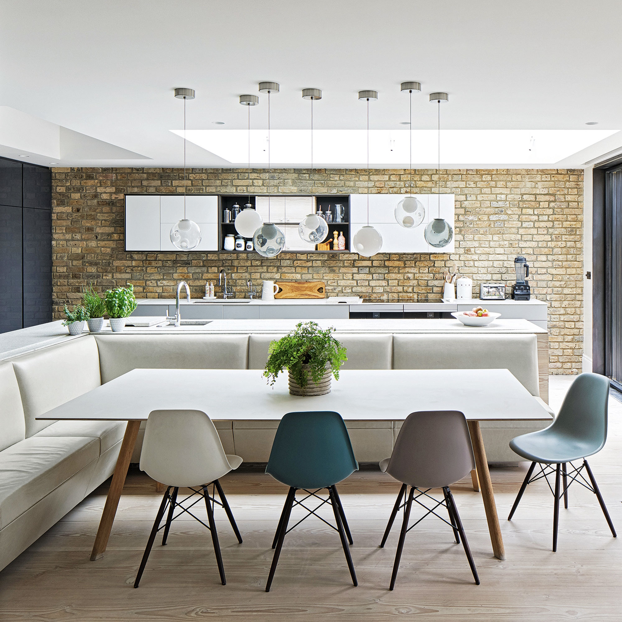 Dining Set With Integrated Seating And Globe Lights