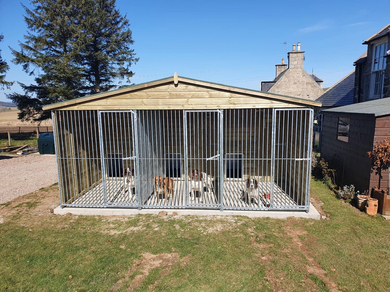Dog Kennel: Four Compartment Pitched Wood Roof
