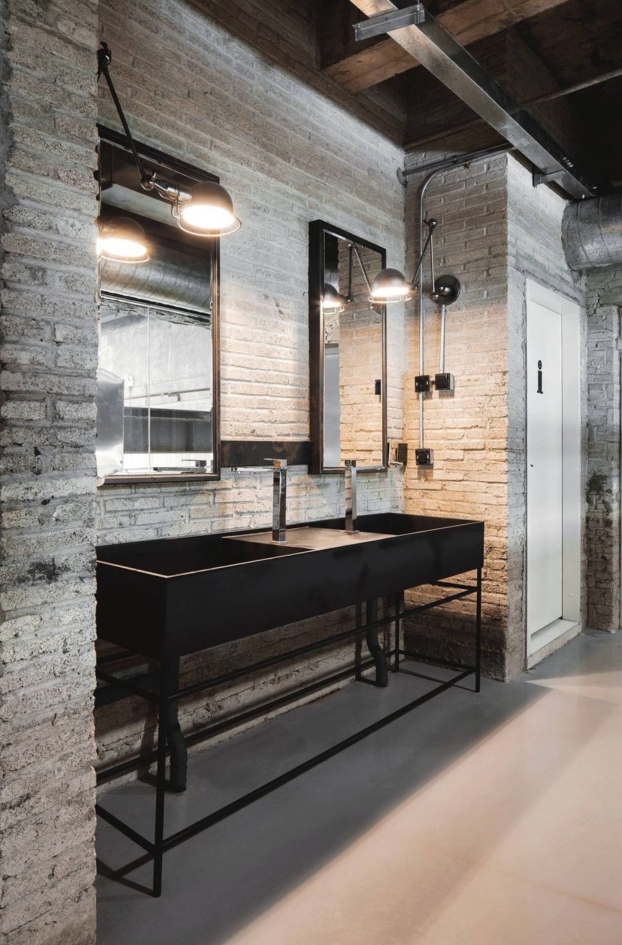 Double Vanity with Trough Sink and Exposed Brick