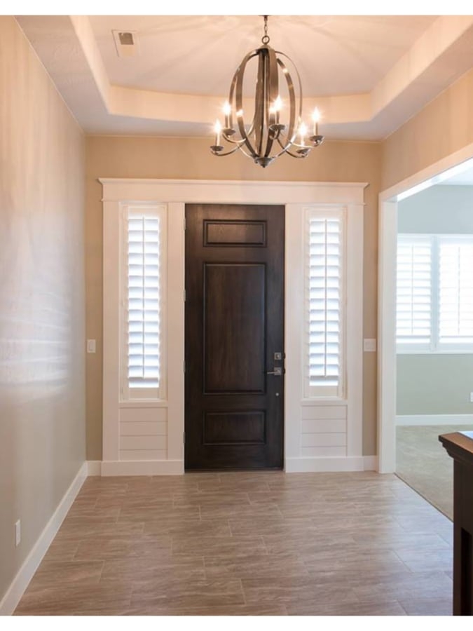 Entry Door Dark Wood Toned Door Orb Chandelier Sidelights
