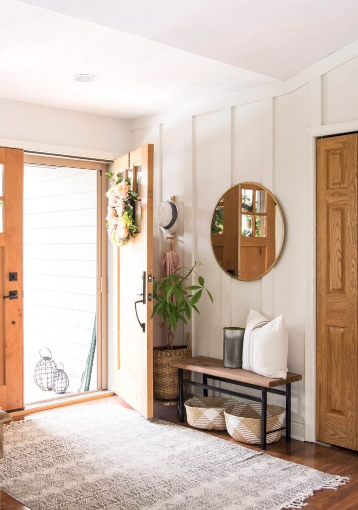 Entryway Bench with Narrow Profile and Round Gold Foyer Mirror