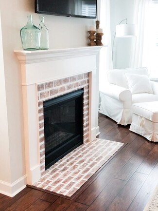 Fireplace Whitewashed Brick White Fireplace with Dark Floors
