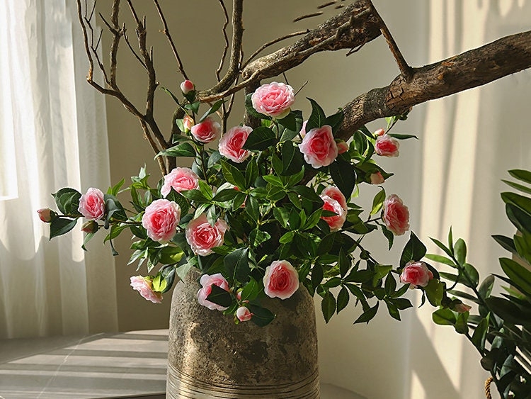 Flower Branch with Weathered Branches and Pink Centerpiece