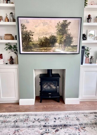 Freestanding Stove White Brick Backsplash Sage Green Accent Wall