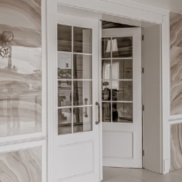 French Doors with Divided Lite Panes and Luxury Interior Stone Walls