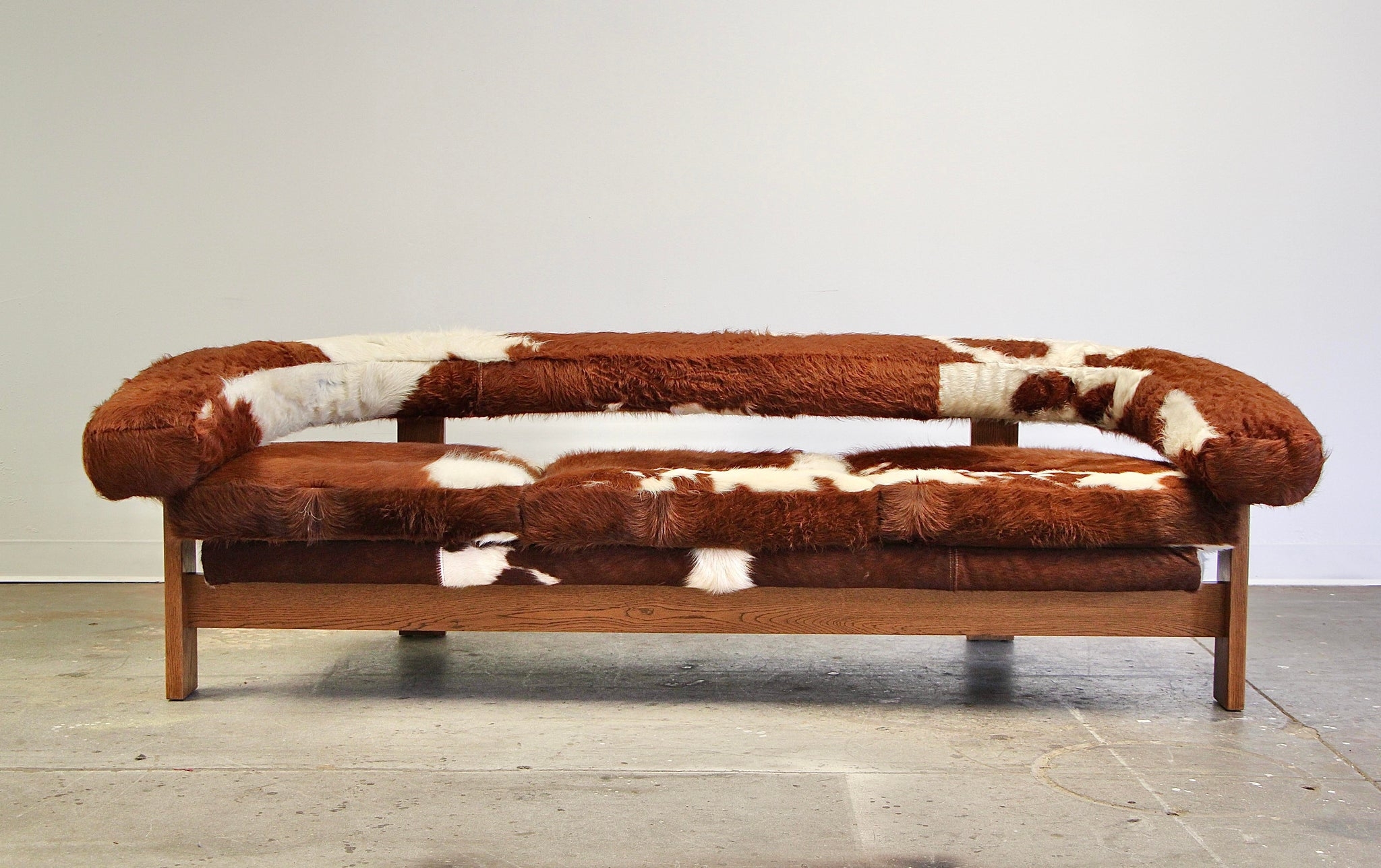 Gondola Sofa in Brazilian Cowhide with Wrap Arms