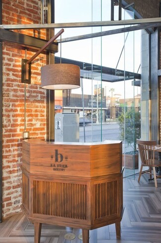 Hostess Stand Slatted Base with Cantilever Lighting and Faceted Front