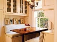 Kitchen Banquette Featuring Glass Front Cabinets
