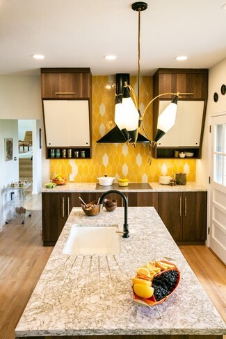 Kitchen Island Yellow Picket Backsplash and Walnut Cabinetry