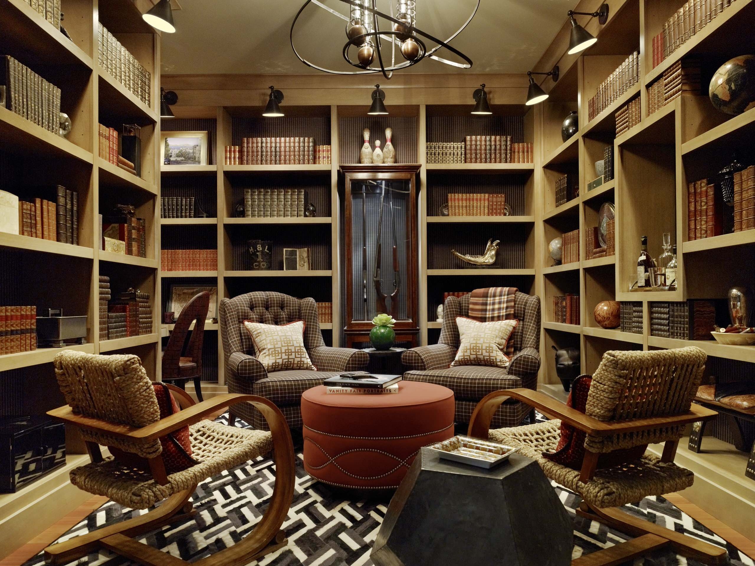 Library Seating Area with Red Ottoman Styling and Boston Lights