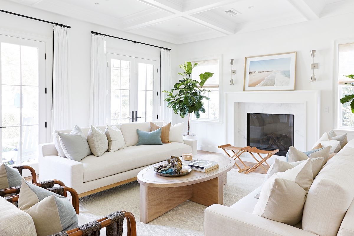Living Room Arrangement with Cross Base Table Coffered Ceiling
