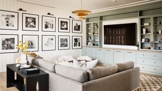 Living Room Built In with Grid Gallery and Sage Green Cabinets