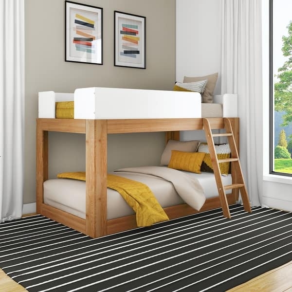 Low Bunk Bed Featuring White Panel Guardrails and Wood Frame