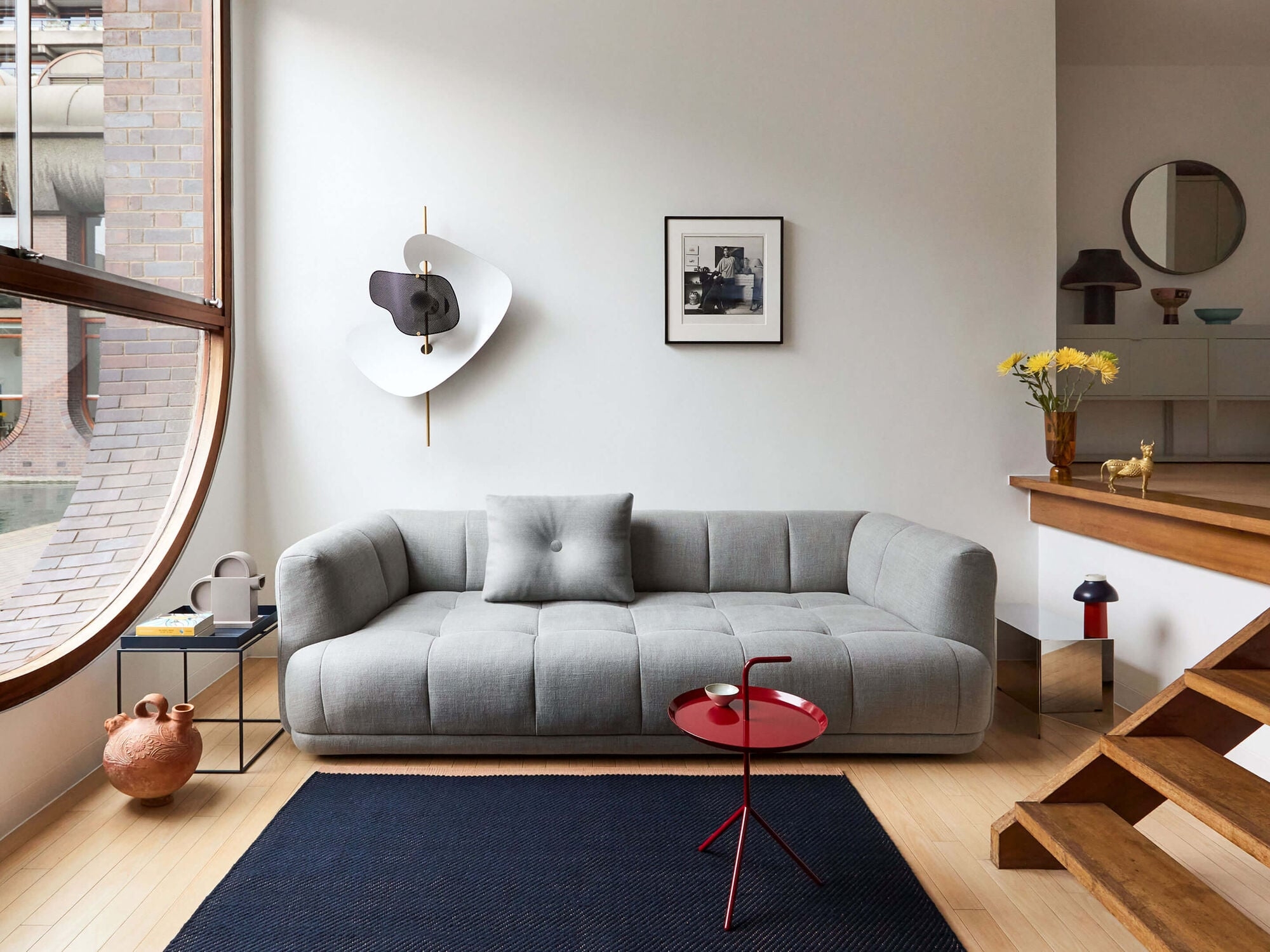 Low Profile Sofa with Biscuit Tufting and Modern Heather Gray Fabric