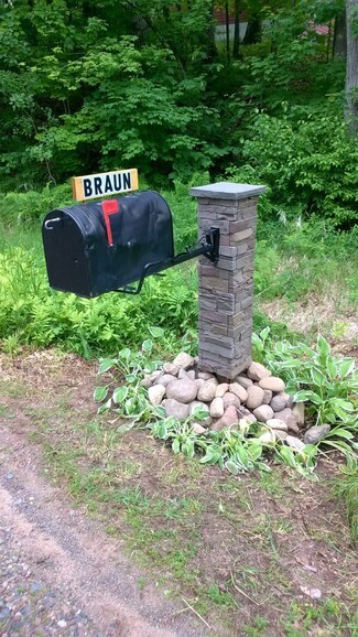 Mailbox Cantilevered Stone Column Cover with Integrated Sign