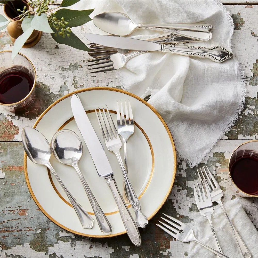 Mixed Flatware Set Ornate Engraving with Distressed Background