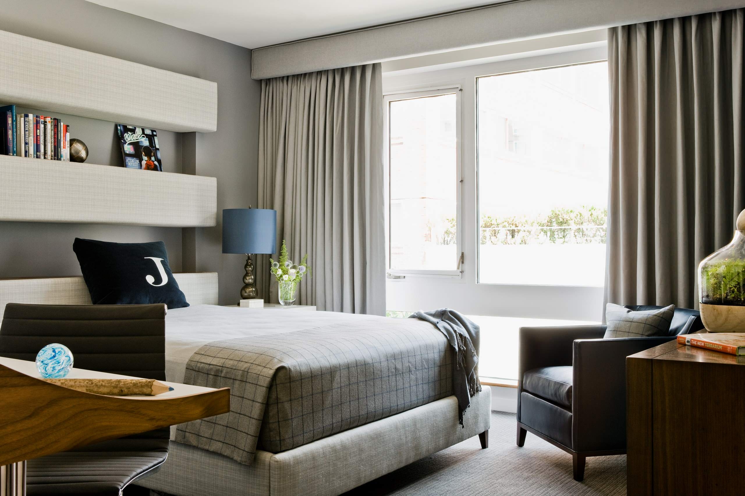 Modern Bedroom: Upholstered Shelves and Navy Monogrammed Pillow