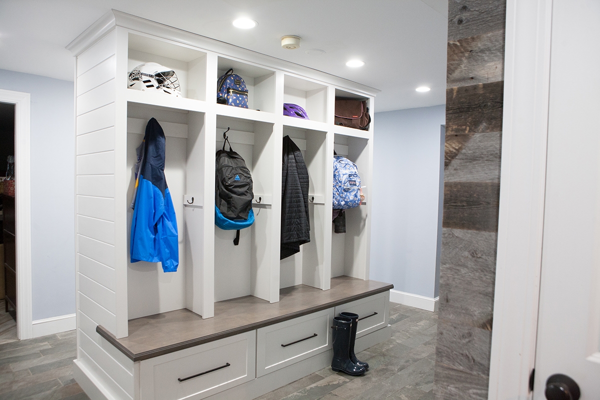 Mudroom Bench with Shiplap Detailing and Black Hardware Hooks