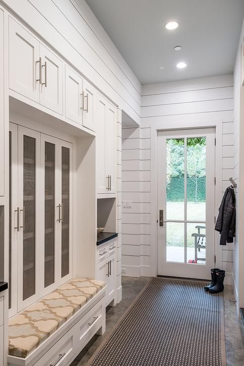 Mudroom Cabinetry with Metal Mesh Doors and Shiplap Walls