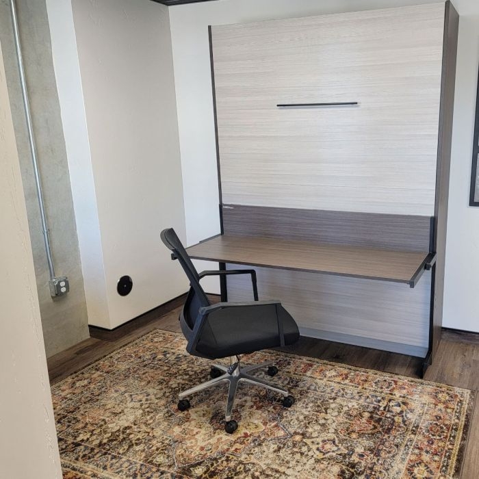 Murphy Desk Bed featuring Contrasting Wood Grains and Compact Frame