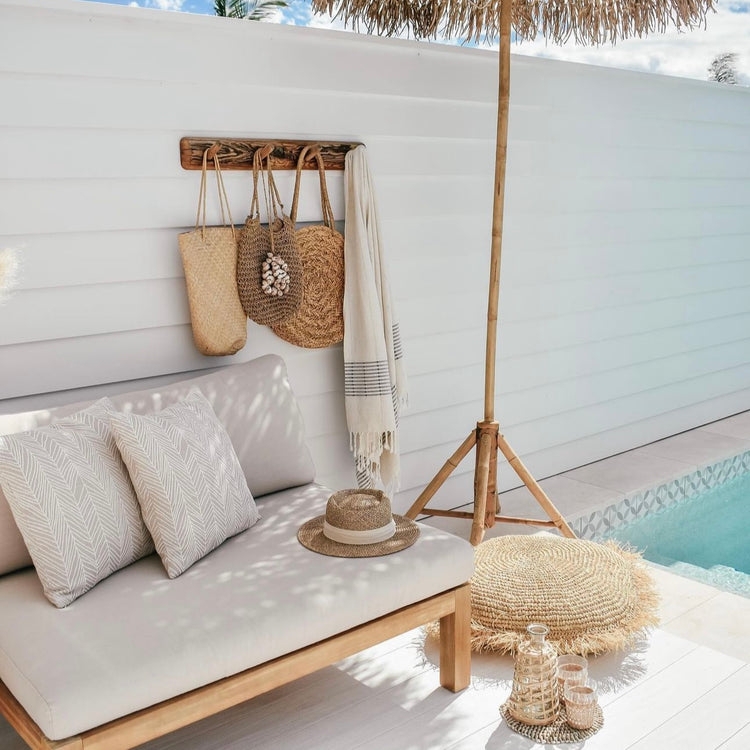 Outdoor Daybed with Woven Wall Storage and Pouffe
