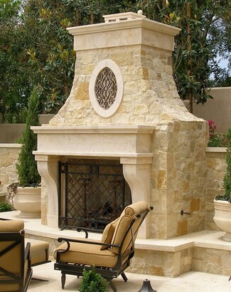 Outdoor Fireplace: Custom Stone Design With Oval Medallion Insert