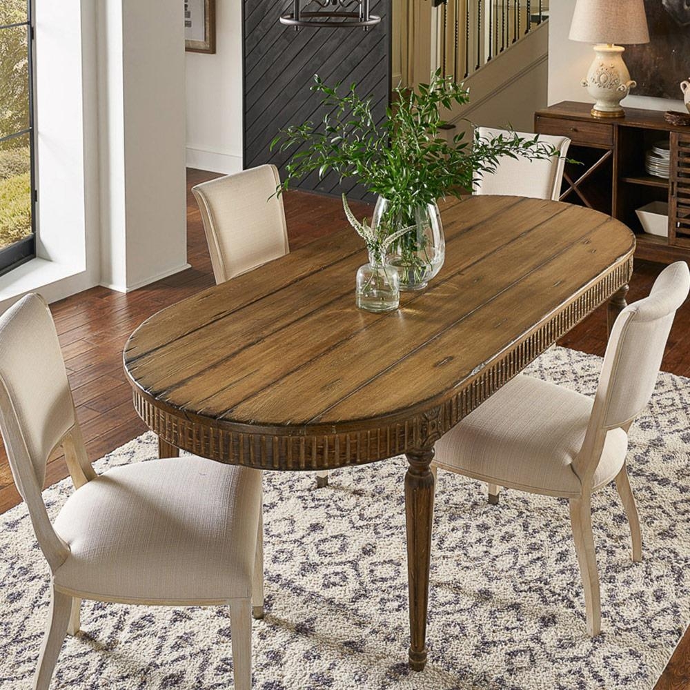 Oval Dining Table Featuring Fluted Apron Plank Wood