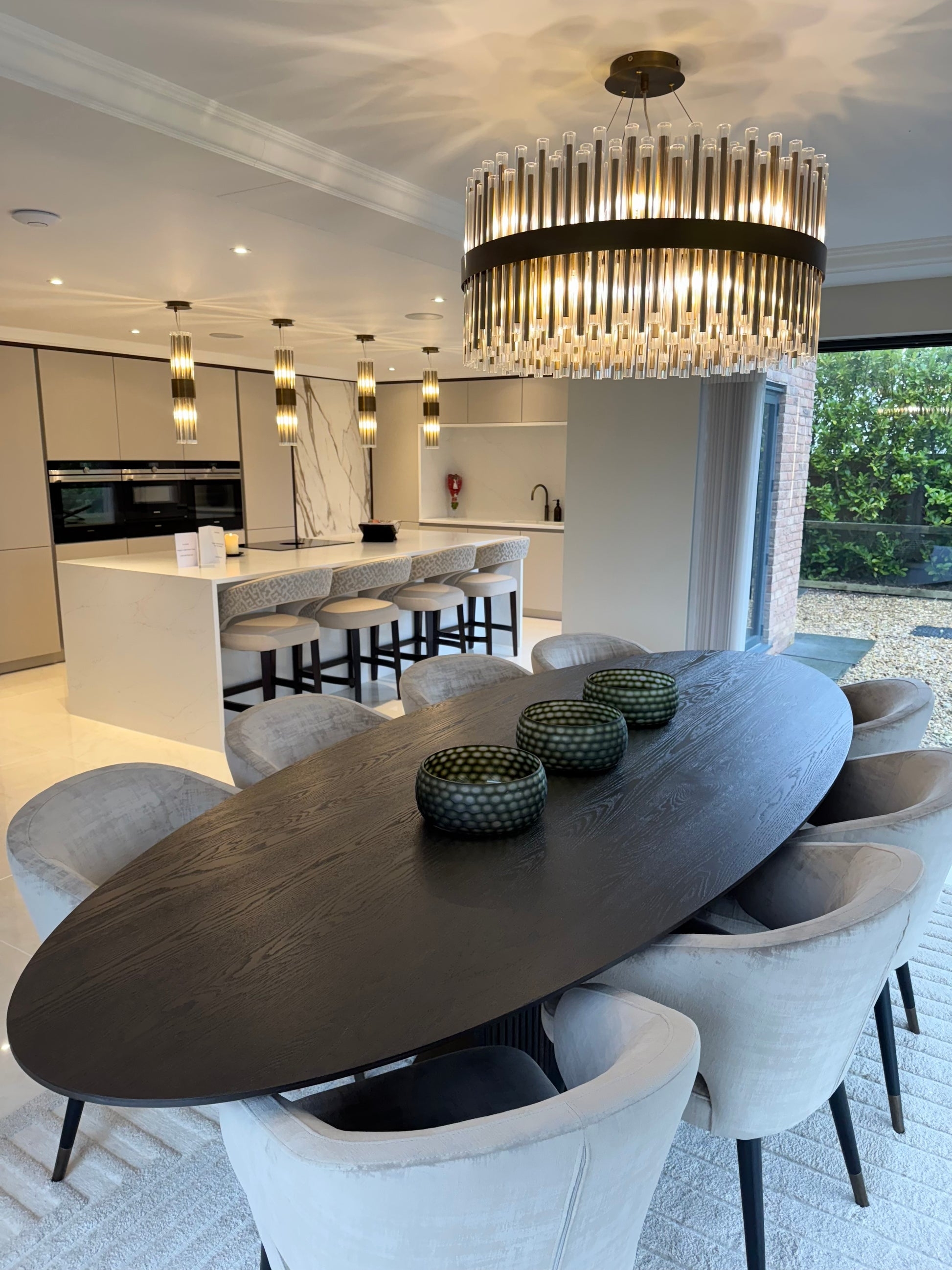 Oval Dining Table Highlighting Charcoal Wood Grain